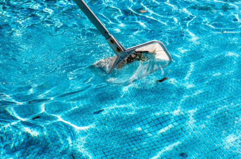 Dirty residential pool with cloudy water and visible algae, indicating the need for professional pool cleaning services in Las Vegas.