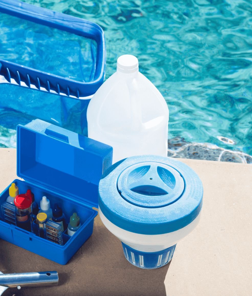 Pool maintenance kit with chlorine floater, chemical test kit, and tools by the water – CrystalPool Las Vegas and Henderson